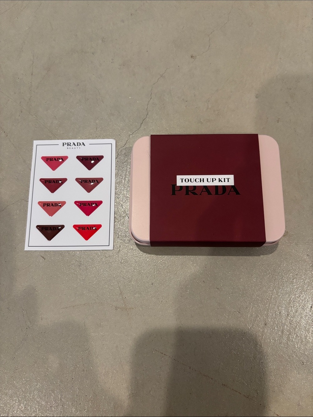 New Prada Beauty TouchUp Kit - tin case, blotting papers, makeup pads & stickers